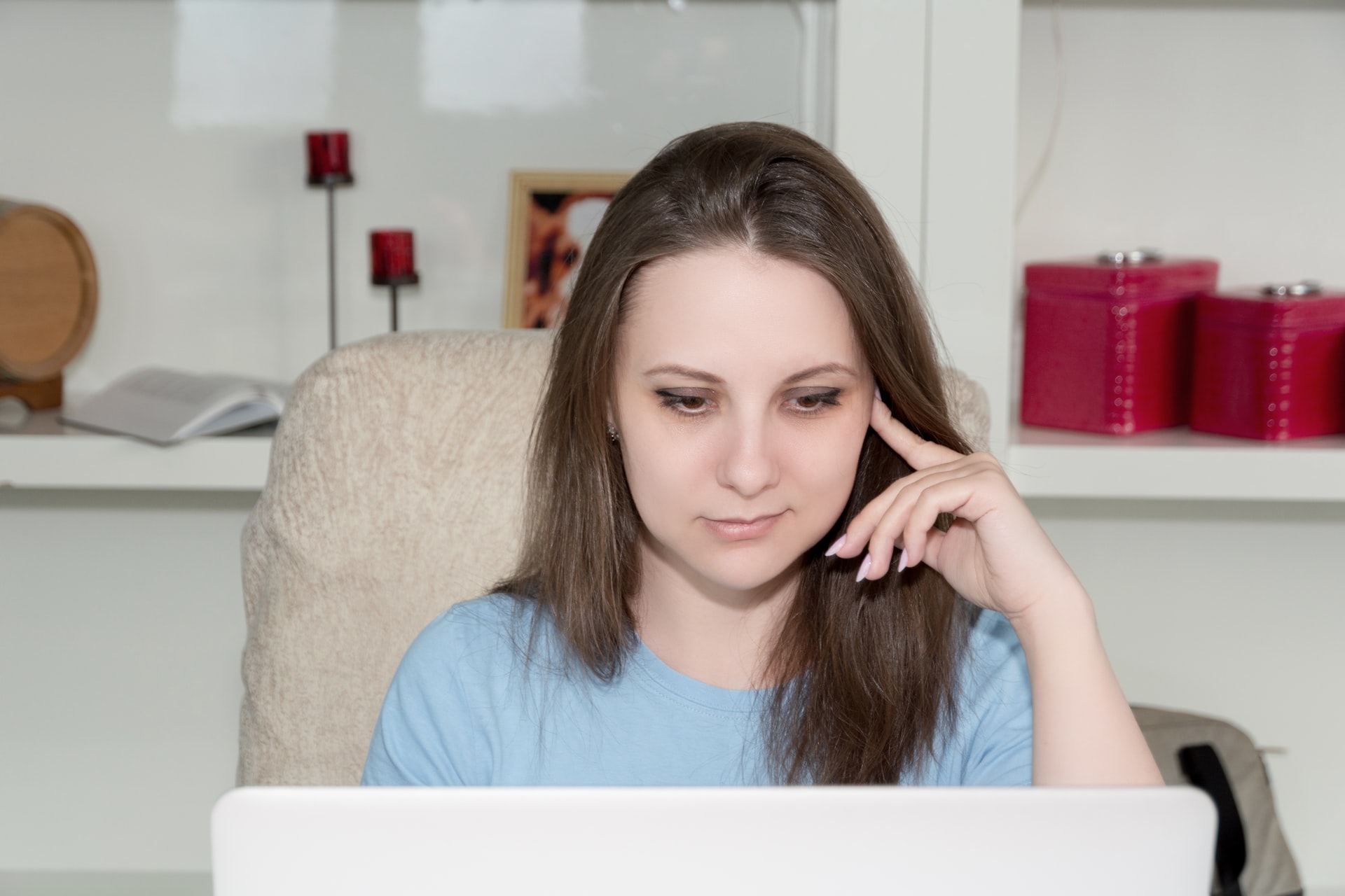 woman suspicious of email